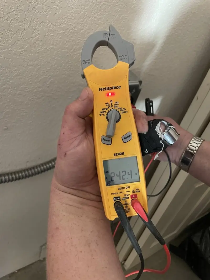 Voltage testing with clamp meter during Aluminum Wiring Replacement in Belmont